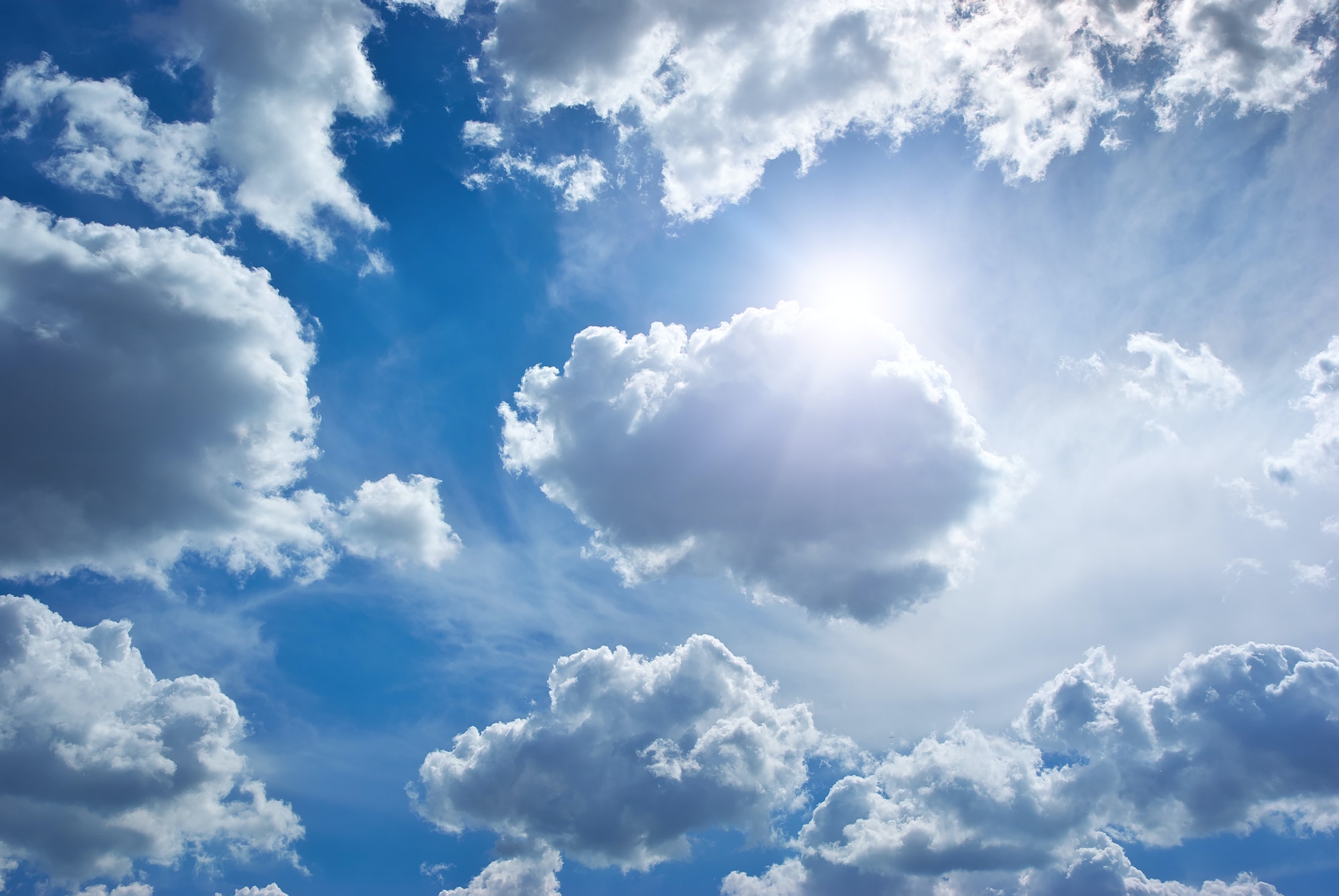 Blue skylight and fluffy cloud.
